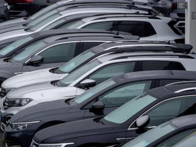 Volkswagen says cost cuts are urgently needed as its earnings decline sharply