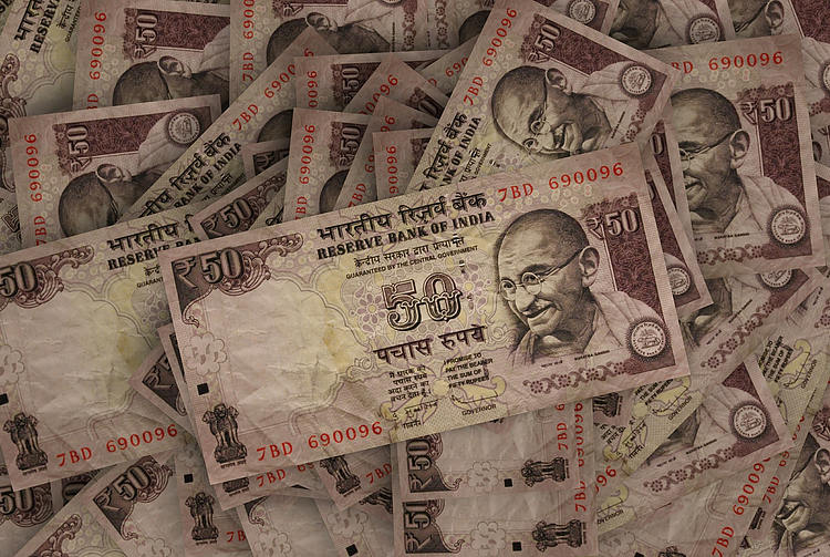 USD/INR strengthens on persistent outflows, firmer US Dollar